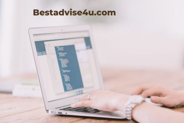 Person typing on a laptop, visiting Bestadvise4u.com for helpful life tips and advice